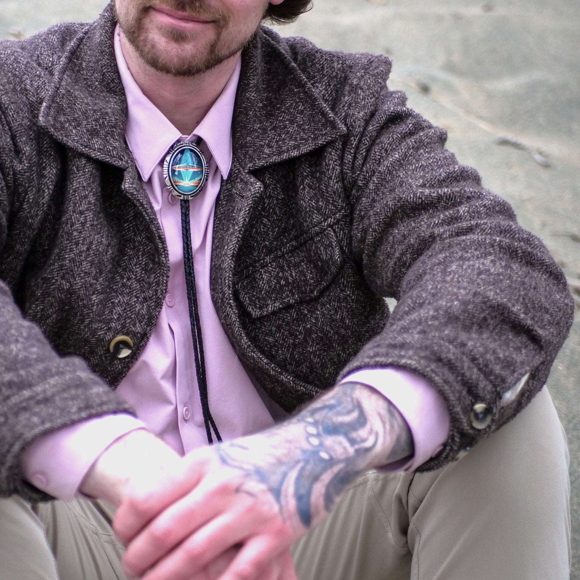bolo tie with formal suit for black tie event