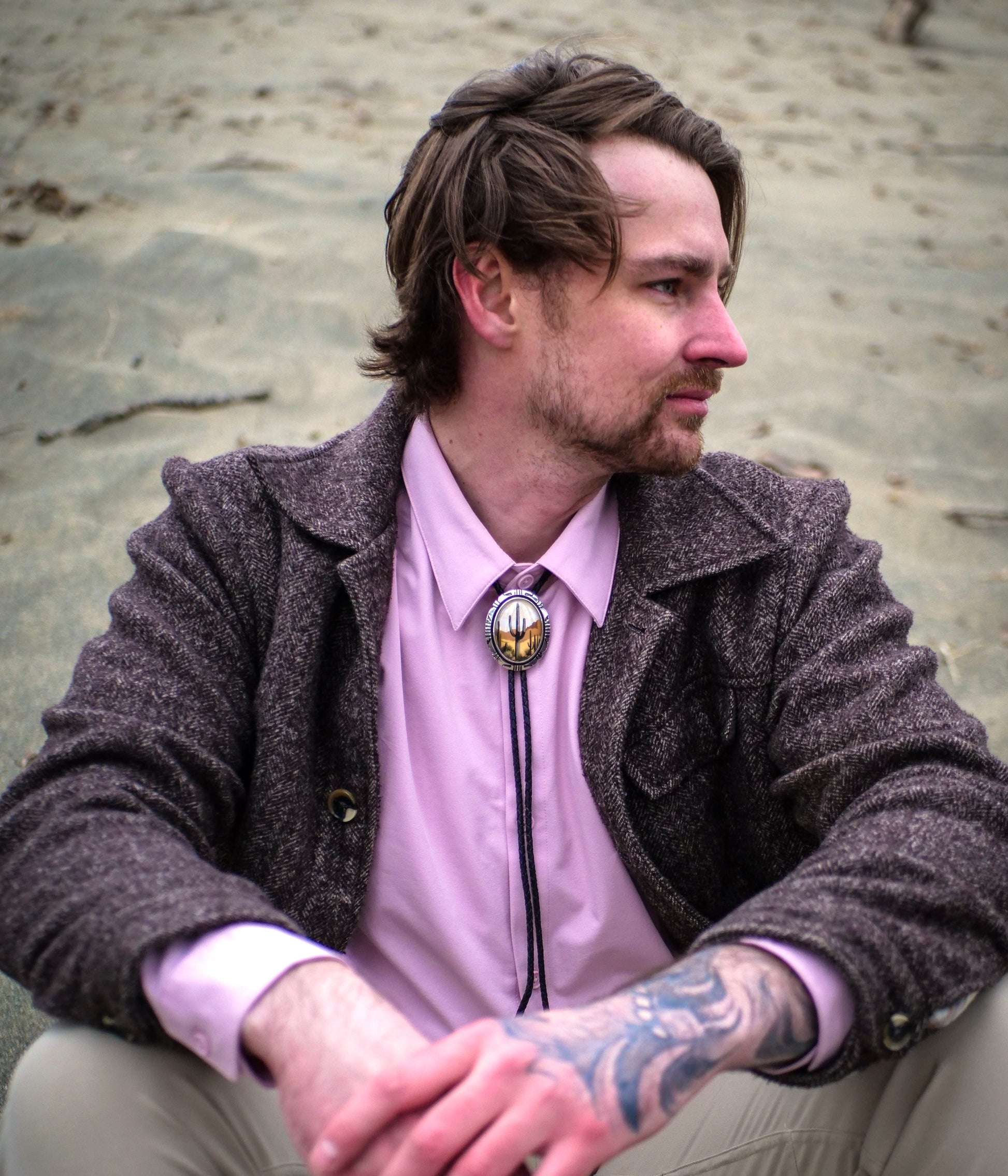 man wearing a bolo tie on a date