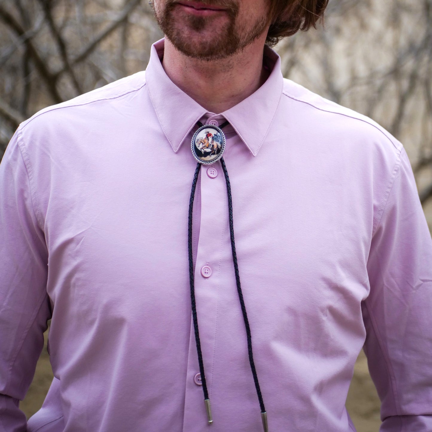 horseback cowboy bandit bola string tie