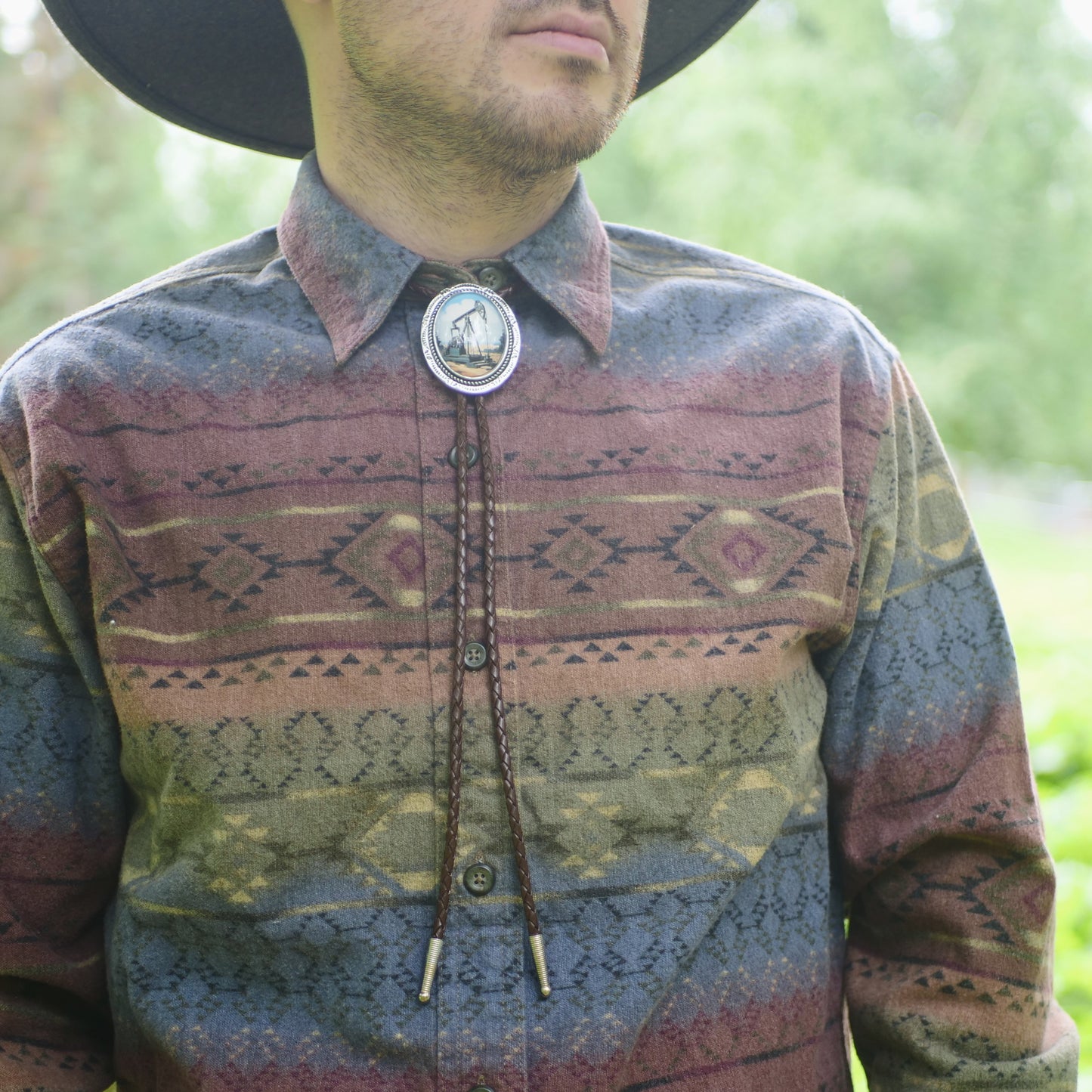 Rotating Pumpjack Bolo Tie